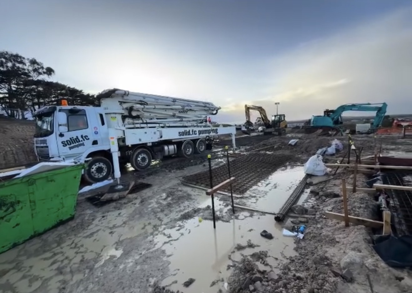Solid FC boom pump on foundations jobsite