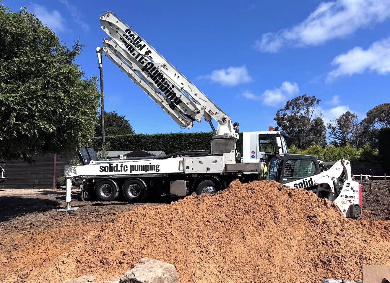 Solid FC boom pump deployed residential